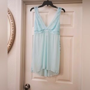 Secret Treasures negligee is a size Large.
